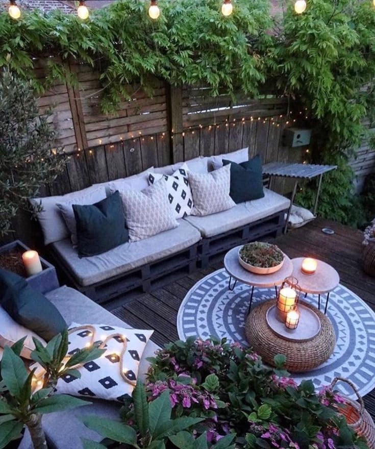 Charming Nighttime Garden Sofa Retreat