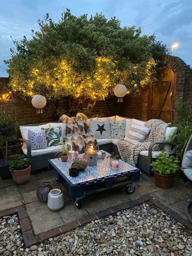 Cozy Outdoor Nook Under Twinkling Lights