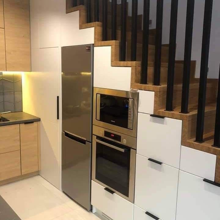 Modern Kitchen Storage Under Stair Design