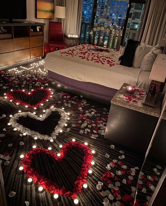 Bedroom with Heart-Shaped Petals and Candlelit Ambiance