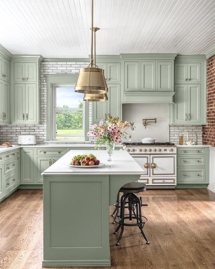 Elegant Sage Green Kitchen with Gold Accents