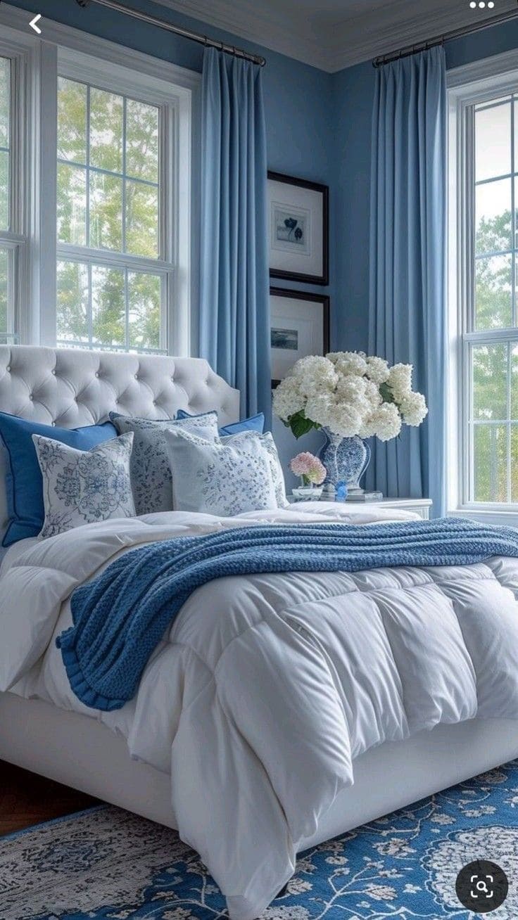 Elegant Sky-Blue Bedroom with Floral Charm