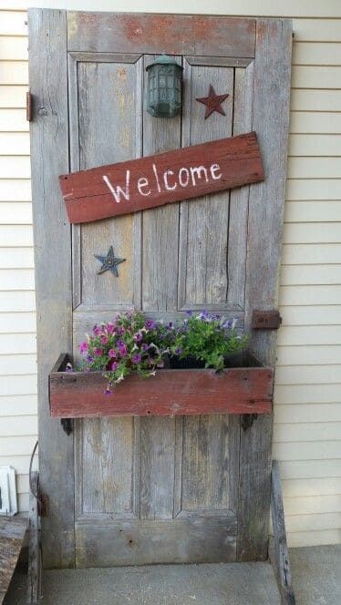 Charming Welcome Door with Rustic Planter