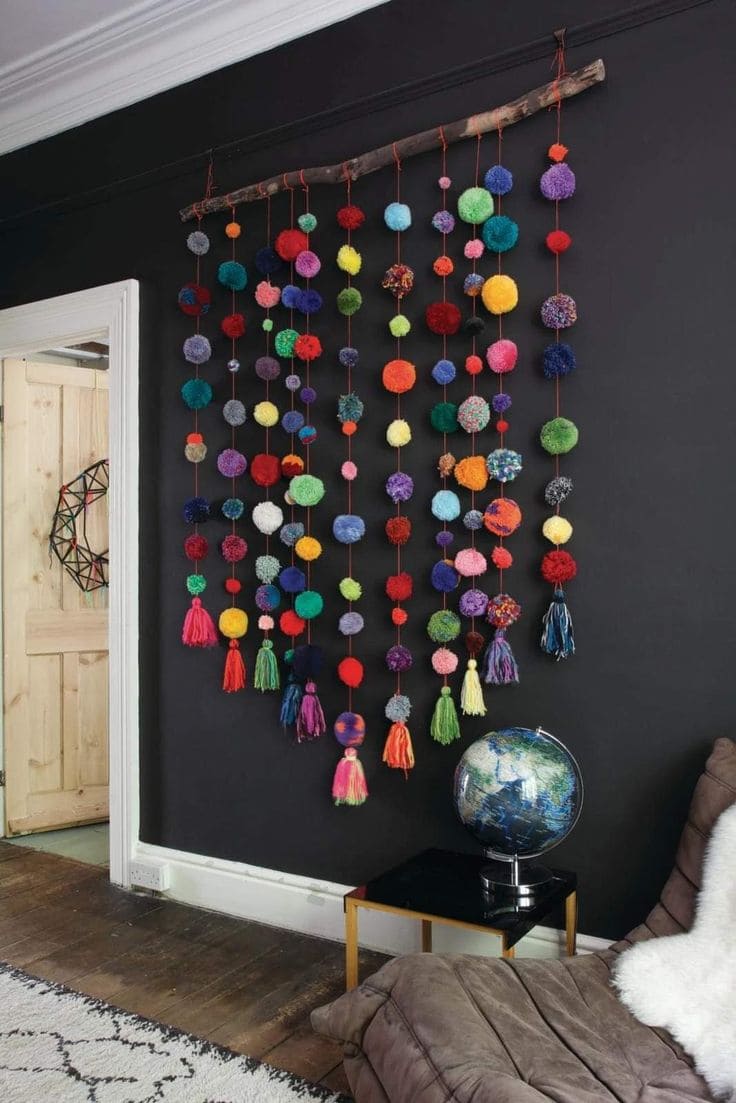 Vibrant Pom-Pom Wall Hanging for a Playful Touch