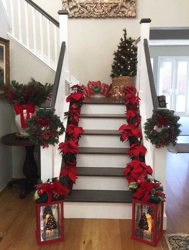 Festive Poinsettia-Lined Christmas Staircase Cheer